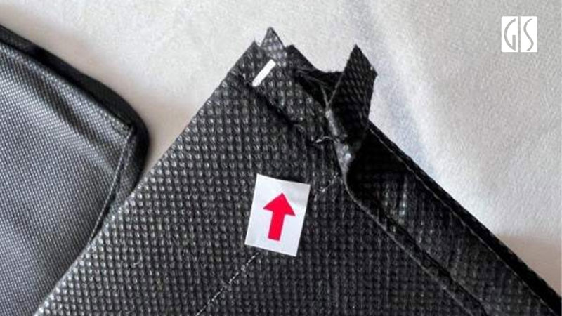 Broken stitching defect on a bag detected during quality inspection