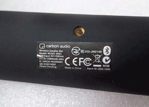 GIS inspector checking the FCC label on a Bluetooth speaker during a pre-shipment inspection in China